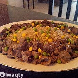 طريقة عمل أرز بالكبد والقوانص والبازلاء 