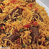 الأرز مع لحم الغنم والطماطم والبازيلا