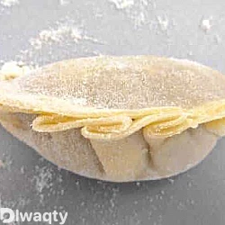 طى عجينة السمبوسة 