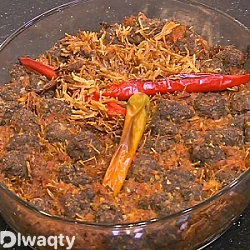 طريقة عمل طاجن الشعرية بالكفتة