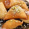 طريقة عمل حلى مثلثات السميد بالفيديو