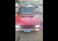 سياره فيات 128 لون احمر