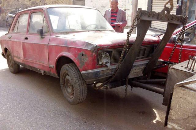 ضبط عصابة تسرق السيارات الهالكة لبيعها خردة 