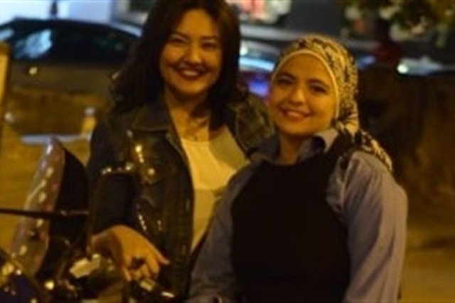 لأول مرة . . مصرية تعمل في نقل الركاب بالاسكوتر