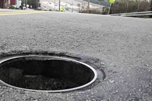 كابينة مفتوحة في شار ع التسعين وازالة اشغالات من موقف العاشر