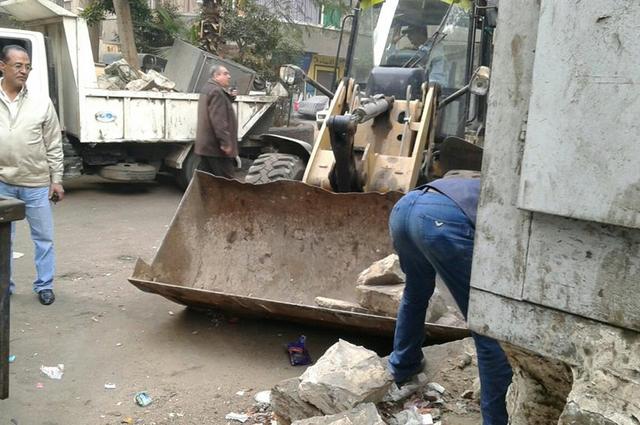 تحقيق سيولة مرورية بروض الفرج ورفع السيارات القديمة من حدائق القبة