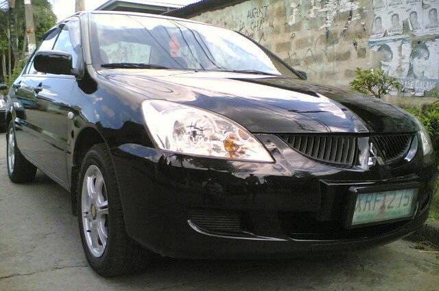 لانسر 2004 . . قدمت من 13 عام بسعر 97.500 جنيه وسعرها الآن 122 ألف 