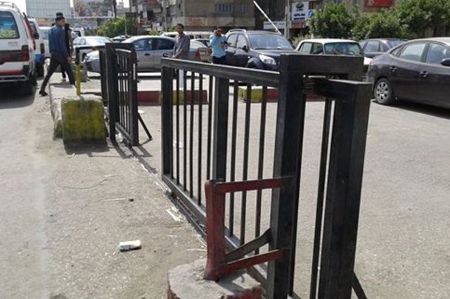 ضبط مخالفات مرور في 6 أكتوبر ورفع حواجز من طريق النصر