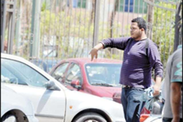 مهنة السايس في خطر بالقاهرة وخريطة قريباً لمواقف السيارات 